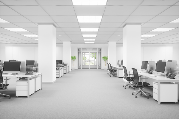 large white office full of empty desks